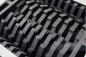 精准调控双轴撕碎机出料尺寸的五大核心因素