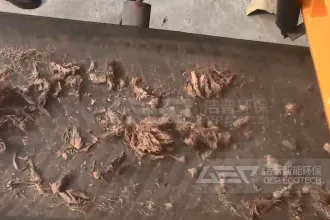 油棕壳破碎做燃料怎么选择撕碎机?